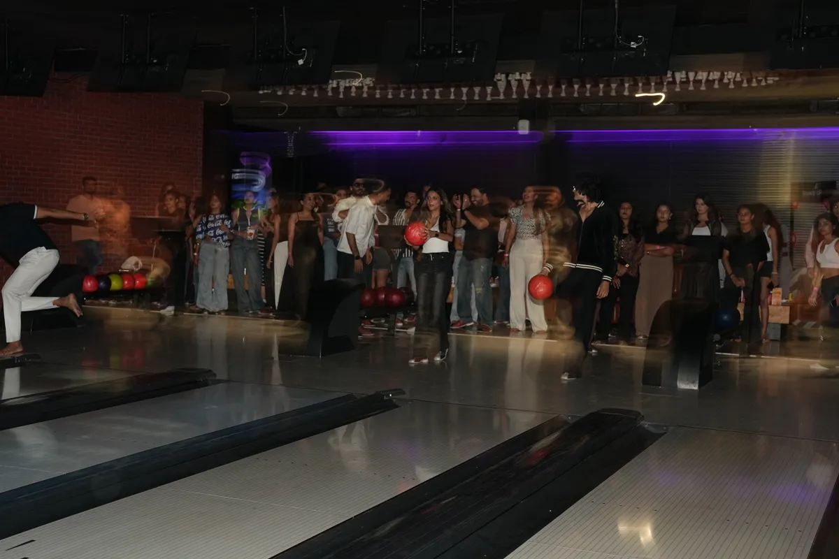 A packed house on the bowling lanes at Strike Social