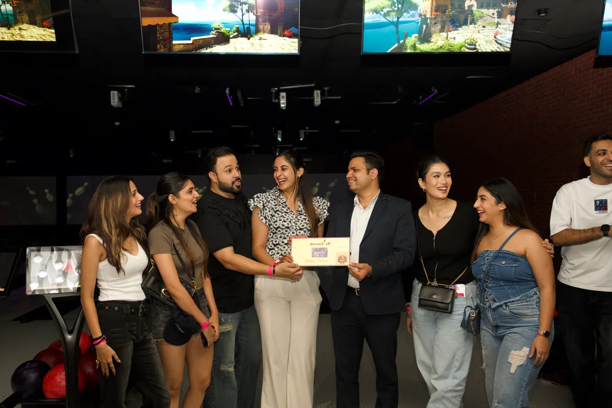 Strike Social winners with their prize