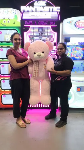 BounceUp winner with their prize